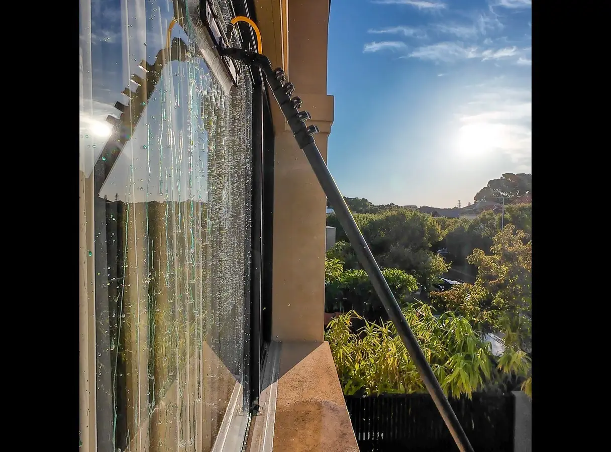 Water-fed pole window cleaning at height in Perth